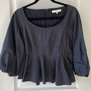 Black, Tibi blouse with peplum waist and puff sleeves.
